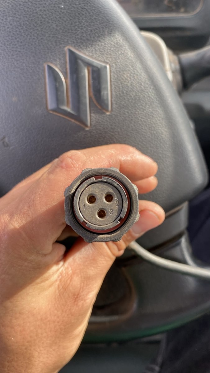 Field photo: WEIPU SP21 motor connector mating face, 3 contacts numbered 1-3